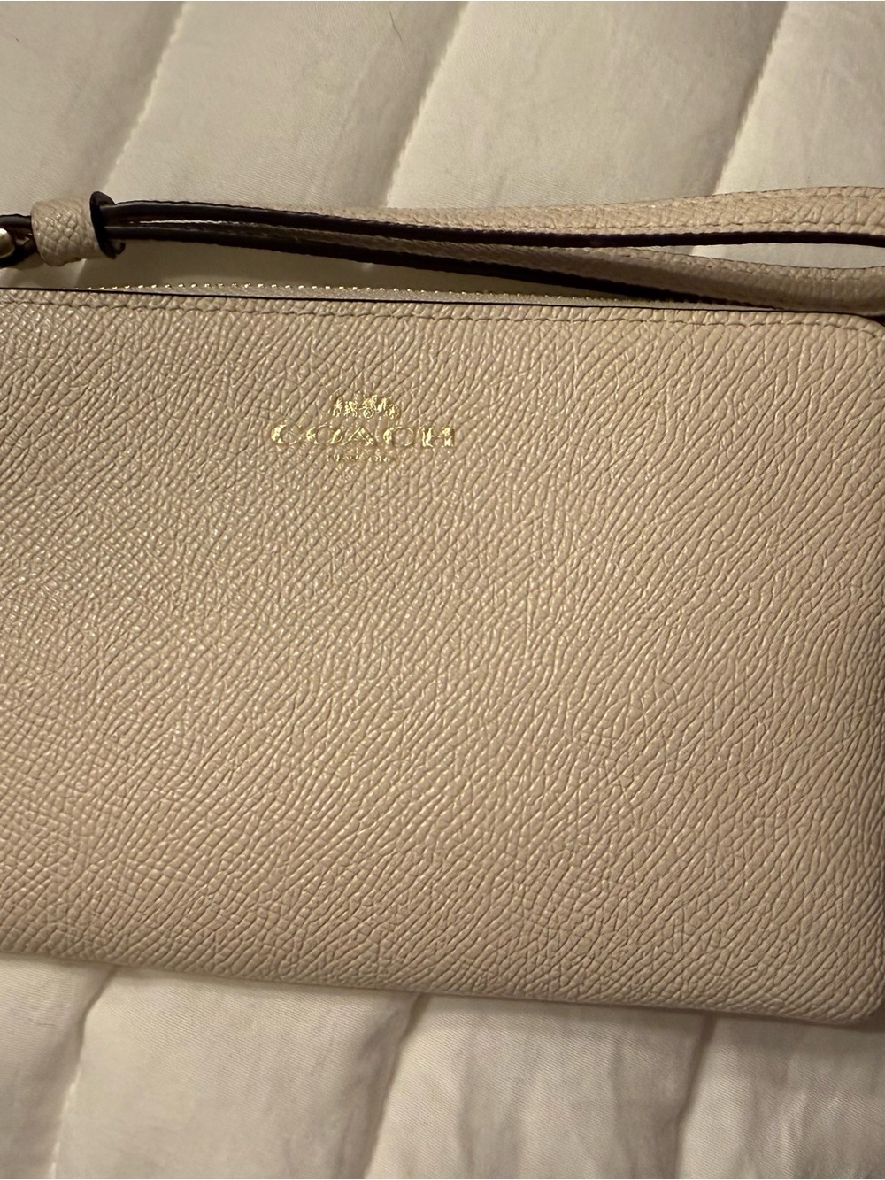Coach Pebbled Leather Wristlet in Cream with Gold Logo